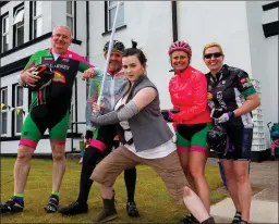  ??  ?? Killarney cyclists Brendan Laidir, Andy Buckley, Heather MacIver and Gillian Curran run into Rebel fighter Rey at the family fun day in the Royal Hotel on Valentia as part of the May The 4th Be With You Festival.