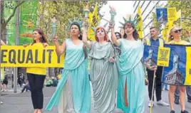  ?? AFP ?? Women wearing Statue of Liberty costumes protest US President Donald Trump's immigratio­n policies in Sydney's Martin Place on Wednesday.