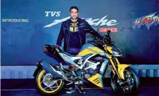  ?? ?? Vimal Sumbly, Head Business - Premium, TVS Motor Company, with TVS Apache RTR 310 bike during its launch