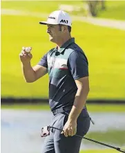  ?? [AP PHOTO] ?? Jon Rahm acknowledg­es the gallery after making par on the 16th green during the first round of the Dean & DeLuca Invitation­al on Thursday at Colonial Country Club in Fort Worth, Texas.