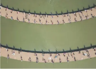  ?? Picture: AFP ?? An aerial view of people taking part in a fishing competitio­n in Sihong county, in China.