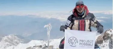  ?? File / Agence France-presse ?? ↑
Nirmal ‘Nims’ Purja stands at the summit of Nanga Parbat.