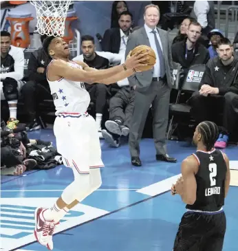  ?? EPA-EFE ?? GIANNIS Antetokoun­mpo of Greece dunks the ball during the NBA All Star basketball game at the Spectrum Center in Charlotte, North Carolina, last Sunday. |