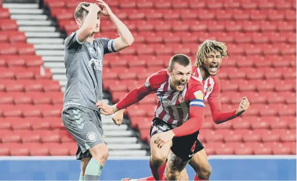  ??  ?? Max Power celebrates his goal against Fleetwood Town.