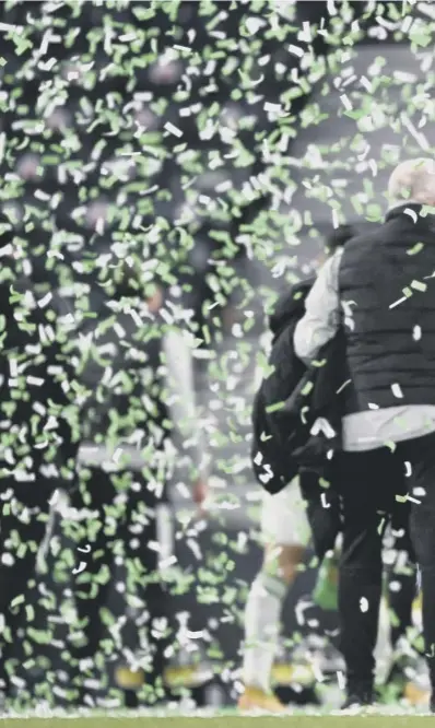  ??  ?? 0 Neil Lennon soaks up the celebratio­ns following Celtic’s cup final success. It was often a fraught