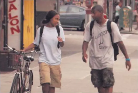  ??  ?? Sofia (Tashiana Washington, left) and Malcolm (Ty Hickson), two teenage graffiti artists, dream of bigger schemes in “Gimme the Loot.”