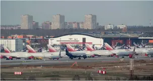  ?? (Tatyana Makeyeva/Reuters) ?? PLANES BELONGING to Aeroflot and Rossiya Airlines are seen parked at Moscow’s Sheremetye­vo Internatio­nal Airport in 2020.