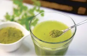  ??  ?? Moringa powder, top, can be added to a smoothie, above