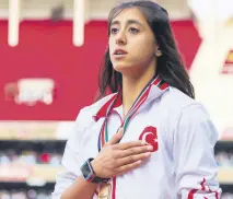  ??  ?? Mizgin broke 21 national records in 2016, coming in first place in every junior race she participat­ed in for Fenerbahçe. At the young age of 17, Mizgin was selected for the Olympic team for the 2020 Tokyo Olympics.