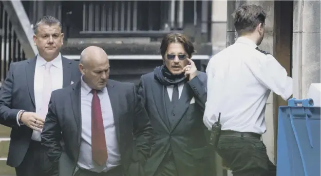  ??  ?? 0 Johnny Depp outside the High Court in London where he is attending a hearing in his libel case against the publishers of The Sun