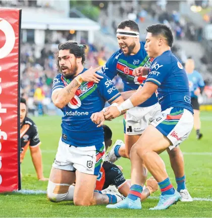  ?? Photos / Photosport ?? Who else? Gutsy captain Tohu Harris scored the Warriors’ first try against Wests Tigers.