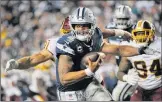  ?? Mark Tenally / Associated Press ?? Washington’s Ryan Kerrigan closes in on Dallas QB Dak Prescott forcing a fumble which Preston Smith recovered for a Redskins’ touchdown to seal Washington’s 20-17 win over the Cowboys Sunday.