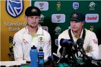  ?? AFP file ?? Australia’s Steve Smith (right) and Cameron Bancroft speaking during a press conference after admitting to ball-tampering during the third test against South Africa. —