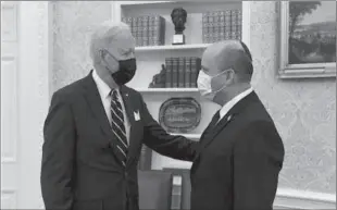  ??  ?? WASHINGTON
Israeli Prime Minister Naftali Bennett calls on US President Biden at the White House.
-AP