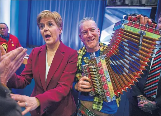  ??  ?? Nicola Sturgeon with party activists in St Andrews after her speech