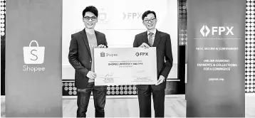  ??  ?? Mok (left) is seen with Tay. In its quest to empower more Malaysians to kick-start their e-commerce journey, Shopee University is collaborat­ing with FPX, the official online payment partner for Shopee, by launching online tutorials for sellers.