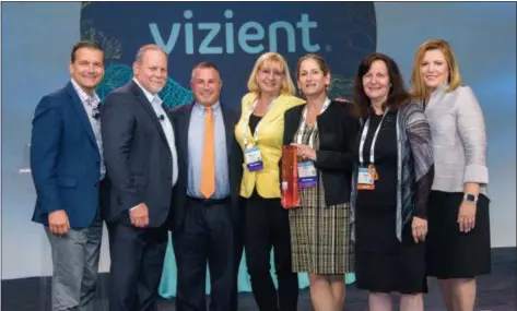  ?? SUBMITTED PHOTO ?? Chester County Hospital’s Mary Lou Lafreniere, Director, Quality Management, left center, and Karen Pinsky, MD, Chief Quality and Medical Informatio­n Officer, right center, were presented the Bernard A. Birnbaum, MD, Quality Leadership Award at the 2018 Vizient Connection­s Summit in Las Vegas.