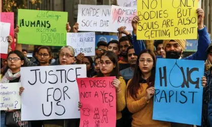  ??  ?? Students and social workers in Amritsar hold placards during a protest seeking for justice for the rape case of a 27-year-old from Hyderabad. Photograph: Narinder Nanu/AFP via Getty Images