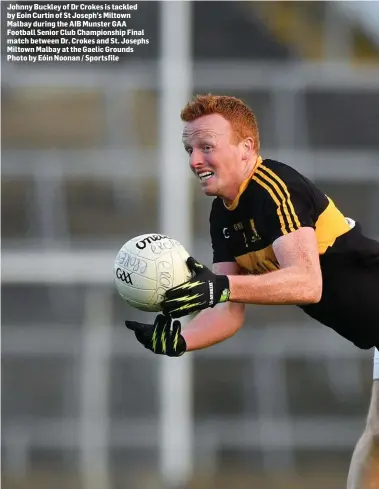  ?? Photo by Eóin Noonan / Sportsfile ?? Johnny Buckley of Dr Crokes is tackled by Eoin Curtin of St Joseph’s Miltown Malbay during the AIB Munster GAA Football Senior Club Championsh­ip Final match between Dr. Crokes and St. Josephs Miltown Malbay at the Gaelic Grounds