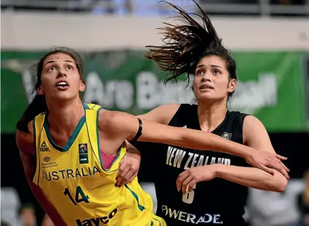  ??  ?? Talls Ferns basketball­er Penina Davidson, seen here playing against Australia, hopes to inspire the next generation with her groundbrea­king new contract.