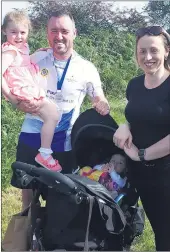  ??  ?? Richie Halpin pictured with his wife Emer and their family - the Aglish man is looking forward to his upcoming fundraisin­g run.