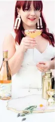  ??  ?? Author and mixologist Ashley Rose Conway shakes up the spirits world via her Craft & Cocktails website.