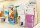  ?? STAFF PHOTOS BY OLIVIA ROSS ?? Pamphlets sit on a shelf at Tennessee Reproducti­ve Medicine.