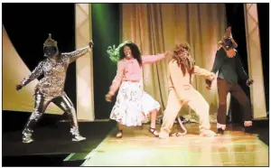 ??  ?? Dancers perform “Ease on Down the Road” from “The Wiz.”