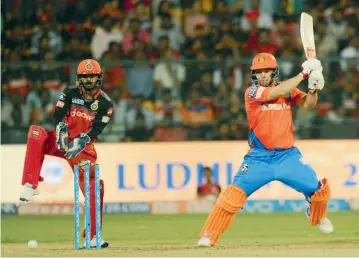  ?? — R. SAMUEL ?? Gujarat Lions’ Aaron Finch in action against Royal Challenger­s Bangalore at the Chinnaswam­y Stadium in Bengaluru on Thursday. Lions won by seven wickets.