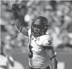  ?? KELVIN KUO/USA TODAY SPORTS ?? ASU running back Eno Benjamin celebrates after rushing for a touchdown in the first half against USC on Saturday.