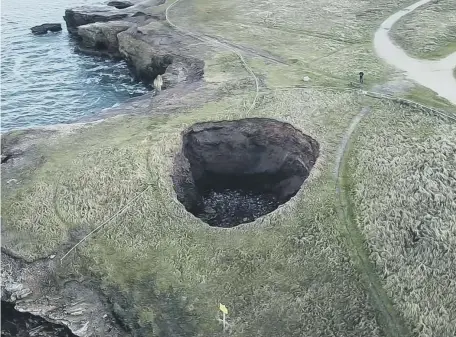  ?? ?? Davy Robson captured the sinkhole in Whitburn on his drone.