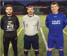  ??  ?? The White Gorillas and Calry captains with referee Philip McLaughlin.