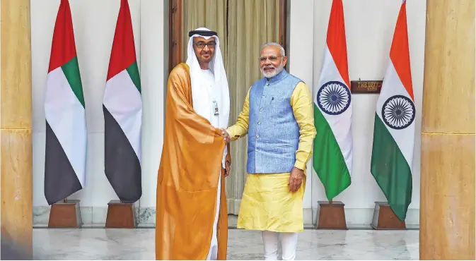  ??  ?? NEW DELHI: The Crown Prince of Abu Dhabi General Sheikh Mohammed Bin Zayed Al Nahyan (L) shakes hands with Indian Prime Minister Narendra Modi ahead of a meeting.