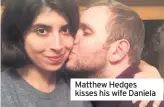  ??  ?? Matthew Hedges kisses his wife Daniela