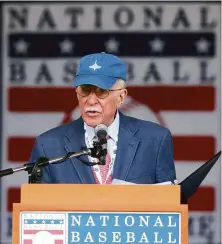  ?? Mike Groll / Associated Press 2014 ?? Roger Angell speaks in Cooperstow­n, N.Y., after receiving the Baseball Hall of Fame’s J.G. Taylor Spink Award in 2014.