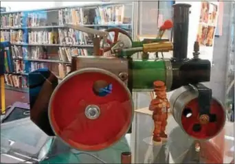  ??  ?? For the month of June, the Aston Public Library hosts a display of antique steam engine toys donated by local collector Ron Vance. Come out to see trains on display outside of children’s area.