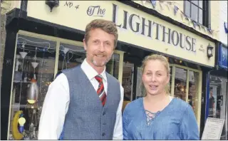  ?? Picture: Paul Amos FM4786564 ?? Doing well: Canterbury Lighthouse owner Anthony Janes and manageress Ellie Bridges celebrate their shop’s 50th anniversar­y