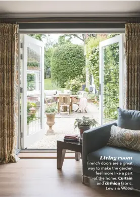  ??  ?? Living room French doors are a great way to make the garden feel more like a part of the home. Curtain and cushion fabric, Lewis & Wood