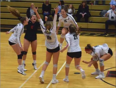  ?? AUSTIN HERTZOG - DIGITAL FIRST MEDIA ?? The Boyertown girls volleyball team celebrates after defeating Pope John Paul II in four sets Thursday night.