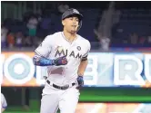  ?? LYNNE SLADKY/ASSOCIATED PRESS ?? Miami’s Giancarlo Stanton rounds the bases after hitting his 55th home run of the season in the Marlins’ win over the Mets Monday.