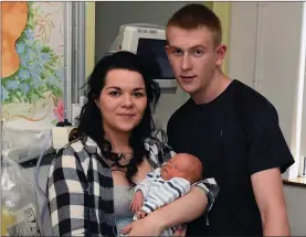  ??  ?? LEFT: Rathmore man Owen Reen and his partner Rebecca Cremin pictured here with their new baby Jayden who made a dramatic entrance into the world last Friday when his dad had to deliver him at the side of the road, outside Killarney. Photo by Domnick...