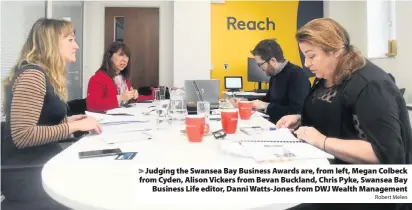  ?? Robert Melen ?? > Judging the Swansea Bay Business Awards are, from left, Megan Colbeck from Cyden, Alison Vickers from Bevan Buckland, Chris Pyke, Swansea Bay Business Life editor, Danni Watts-Jones from DWJ Wealth Management