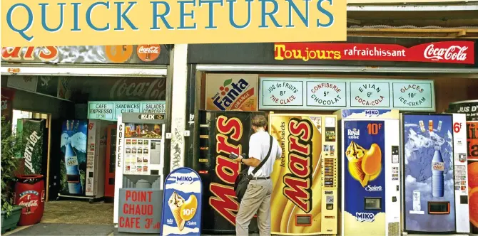  ?? Photo: AFP ?? A man uses a food vending machine in Paris, France