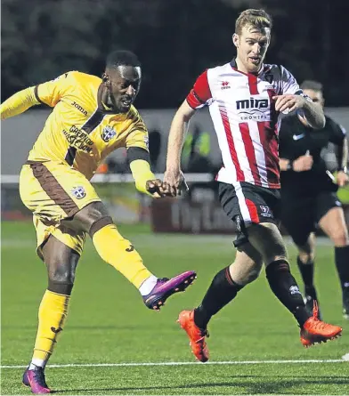  ?? Picture: Getty. ?? Roarie Deacon scores against Cheltenham during Sutton’s United’s FA Cup run.