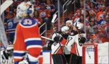  ?? GETTY IMAGES ?? The Ducks celebrate a goal against The Edmonton Oilers on Sunday. Anaheim won, 6-3. The series is now 2-1 for the Oilers.