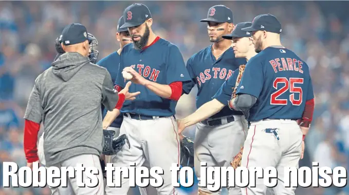  ?? MATT STONE / BOSTON HERALD ?? COULDN’T ASK FOR MORE: Alex Cora takes the ball from David Price, who was the winning pitcher in the Red Sox’ Game 5 win last night.