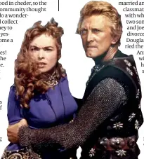  ??  ?? Kirk Douglas reaches his century today. Below: in the film The Vikings with Janet Leigh in 1958