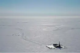  ?? CONOCOPHIL­LIPS VIA AP ?? An explorator­y drilling camp is shown in 2019 at the proposed site of the Willow oil project on Alaska’s North Slope.