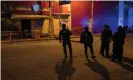  ??  ?? Police officers outside the Caballo Blanco following a deadly arson attack, in Coatzacoal­cos, Mexico, on 28 August. Andrés Manuel López Obrador promised an inquiry would ‘get to the bottom’ of it. Photograph: Stringer/Reuters