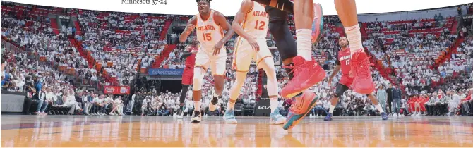  ?? Photo: VCG ?? Victor Oladipo of the Miami Heat drives to the basket against the Atlanta Hawks on April 26, 2022 in Miami, Florida.